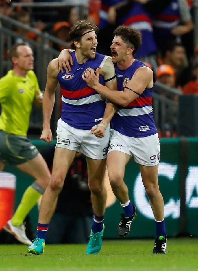 AFL 2016 First Preliminary Final - GWS Giants v Western Bulldogs SYDNEY, AUSTRALIA - SEPTEMBER 24: Marcus Bontempelli (left) and Tom Liberatore of the Bulldogs celebrate during the 2016 AFL First Preliminary Final match between the GWS Giants and the Western Bulldogs at Spotless Stadium on September 24, 2016 in Sydney, Australia. (Photo by Michael Willson/AFL Media)